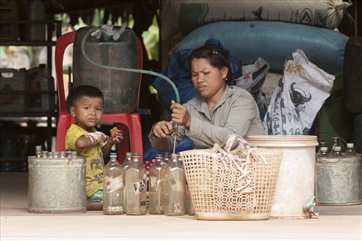 Common to find gasoline sold in Whisky bottles all over rural Cambodia