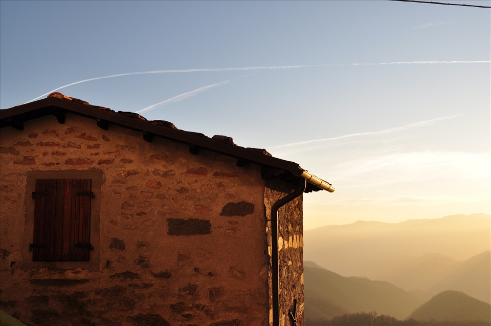 The best view the world. A tuscan house watching the sun set over the hills below.