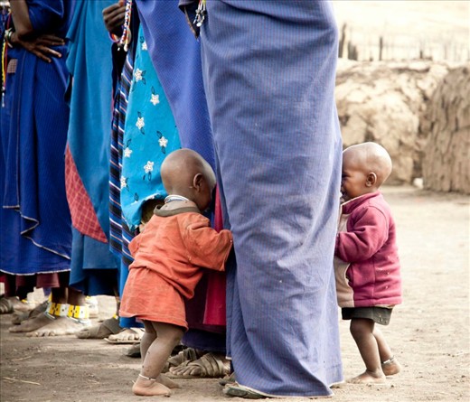 Masai kids playing hide and seek - Ngorongoro, Tanzania