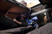 A man is travelling on a ‘6-bed first class’ and lying down on a ‘second floor’ : by alinoorani, Views[384]