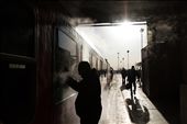 A man is bidding farewell to his family behind a train window as the train is waiting in Tehran’s main train station and is about to set off to Mashhad on a mild winter morning. Oddly for any public place in Iran, photography is often times allowed in and outside trains. : by alinoorani, Views[1072]