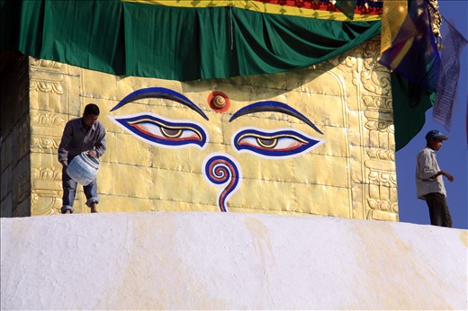 In good karma, the Stupa is white-washed in front of the symbolic Third Eye.