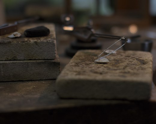 Moira sets up her equipment to start making her jewellery 