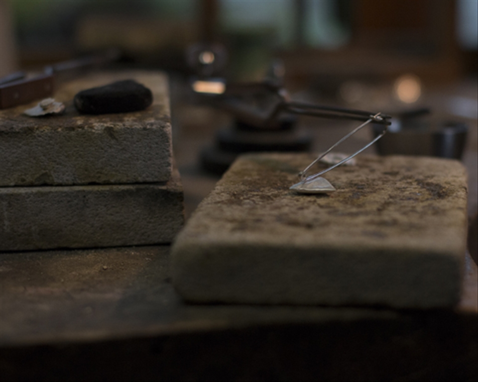 Moira sets up her equipment to start making her jewellery 