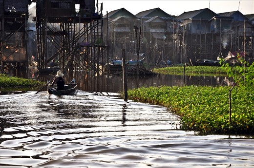 Poverty floating amidst the beauty. A village in Cambodia rely on the river for sustenance.