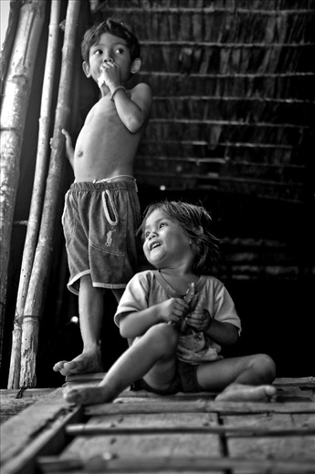 Children as part of a hotel cooking class and tour, the culture of charity tourism in Cambodia is imbibed early on.