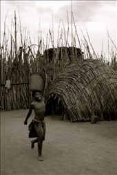 A young boy performing one of the initiation activities to become a member of the Junior Regiment during the Incwala which is a religious ceremony to celebrate the new harvest and revere the King of Swaziland.: by alliebhughey, Views[990]