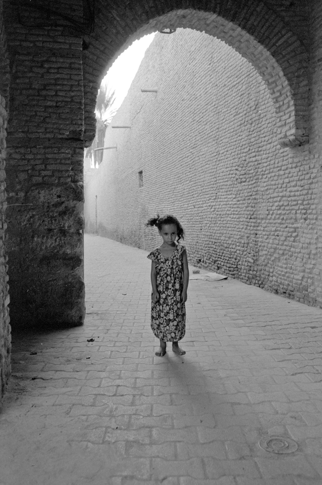 A ruffled girl materialized in front of me, she was the only human being around