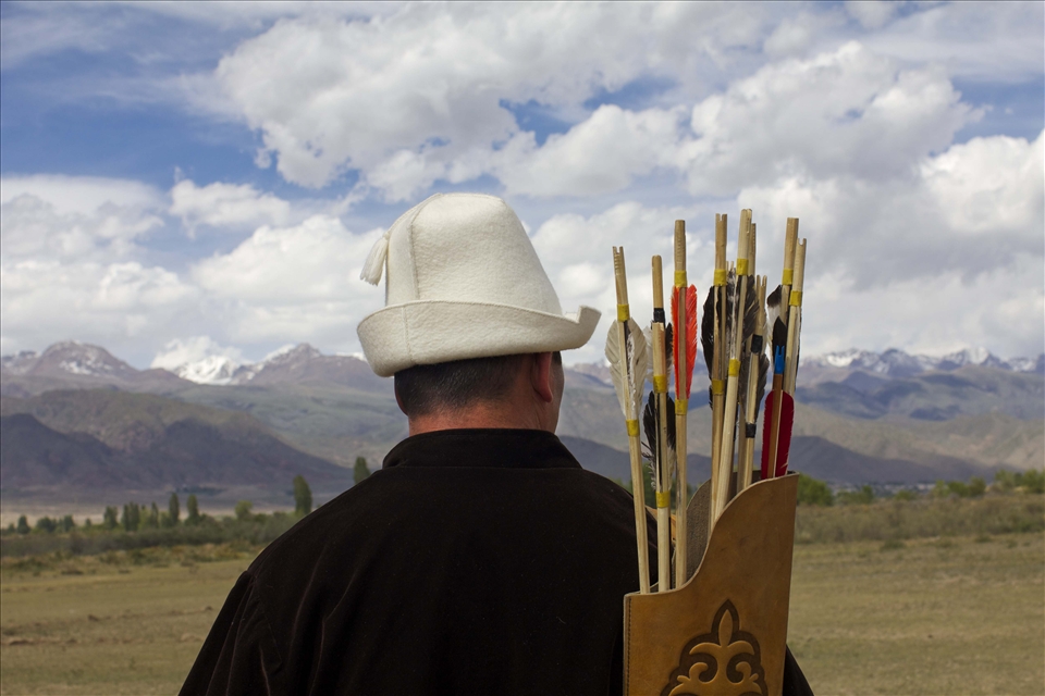 Man surveys the landscape before the hunt.
