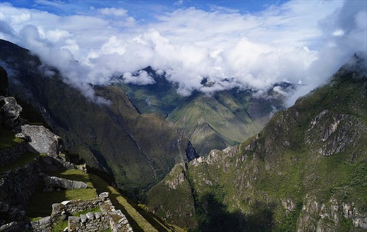 The Magnificent Urubamba Valley:

A fantastic chance to feel yourself like floating in a cloud,  was watching the urubamba valley from Machu Picchu. 
Here  i wanted to show the depth of the valley   and the surrounding areas of this place. 