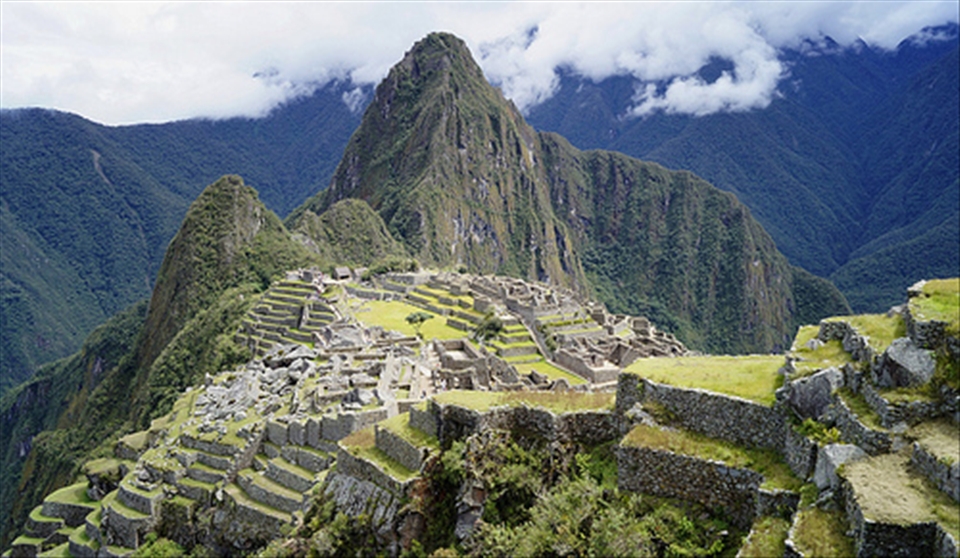 Machi Picchu in all its Glory:

This is probably the typical postcard of  Machu Picchu, but i believe there´s no other way to  convey this place in a better way that seeing the whole structure of the city, carved by the ancient incas in the heart of their empire. 
This place trully deserves the title of marvel of the modern world.