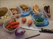 Take leftover vegetables, potatoes, and meat from refrigerator and start dicing.: by amandasz56, Views[600]