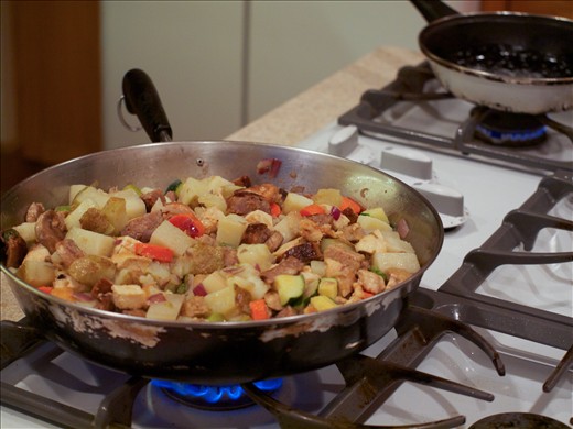 Fry eggs in separate pan while hash is warming & place on top when ready.