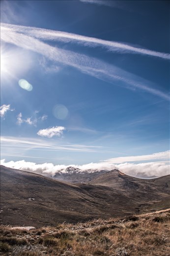 The Peak: Clouds painted the sky and blanketed the Earth from the Sun's belting