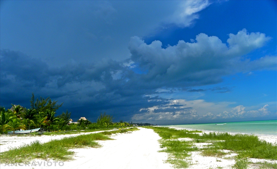 A storm rages near the island but the place itself remains unaffected. 
