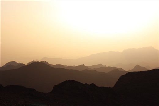 before the sunset from the top of Abbas Mountain you see the shadows of mountain