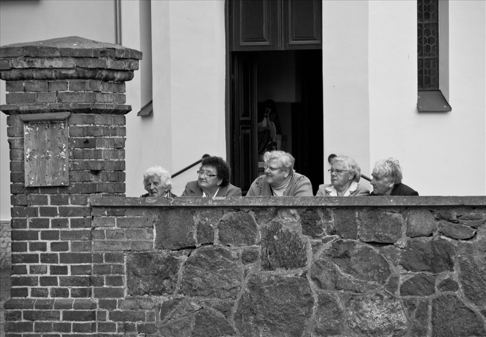 Observing - an important element of villagers' lives.

As a kid I took my first black and white photos in this very village. The Corpus Christi holiday presented here was the last big event I participated in before my mum moved out of the village - when I changed the photos into B&W I realised that some things haven't really changed over the years.