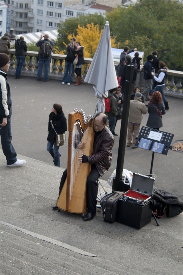 Not only is Paris the city of love it is also a cultural city. Playing to the couples at the Sacre Coeur is a local man whilst you overlook a city of splender.