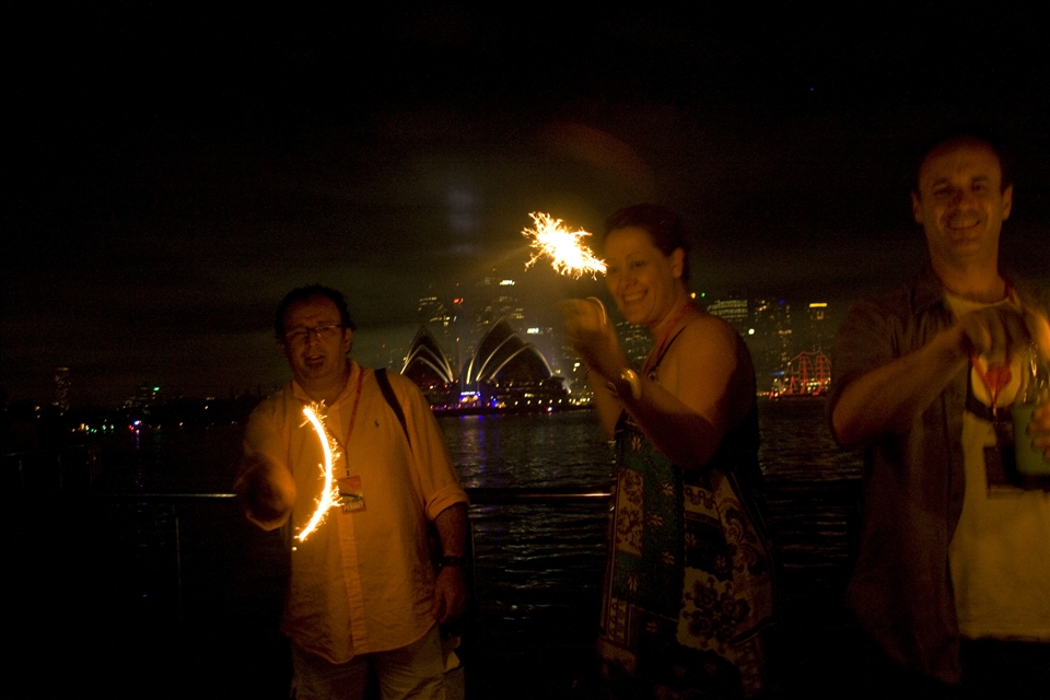 Enjoying the first minutes of the New Year by playing with sparklers. 