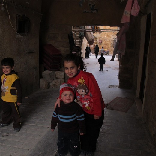 Young children thrilled at having their photo taken