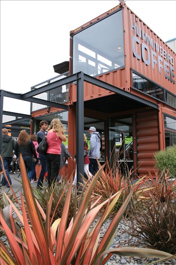 Container cafe - after the city's main shopping strip was destroyed in the earthquake, shipping containers have been used to form a temporary mall while plans are made for a more permanent use of the space. The NZ owners of this 3 container fully functioning cafe have created a special coffee blend donating a portion of all sales to the rebuild of the city's Court Theatre.