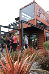 Container cafe - after the city's main shopping strip was destroyed in the earthquake, shipping containers have been used to form a temporary mall while plans are made for a more permanent use of the space. The NZ owners of this 3 container fully functioning cafe have created a special coffee blend donating a portion of all sales to the rebuild of the city's Court Theatre.: by amyharro, Views[6423]