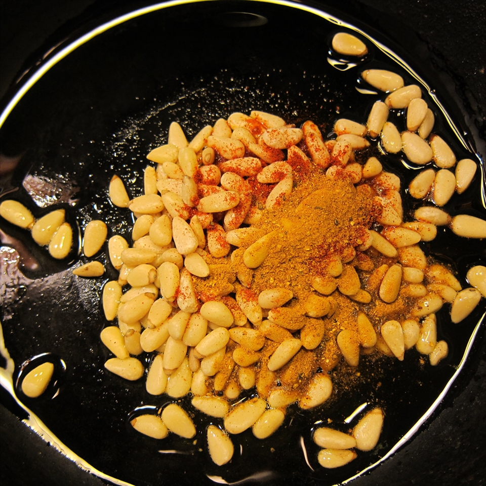 Spiced Pine Nuts in the skillet