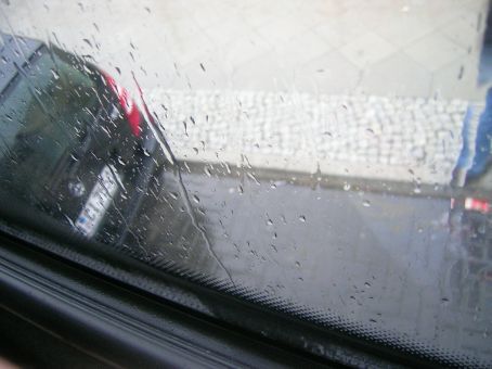 bus about to squash car