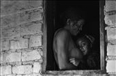 Can you picture yourself living in a place where the nearest neighbour lives 15km away from you? Neither did Da Silva, until her husband asked her to live in the Brazilian hinterlands, also know as Sertão. Suddenly she saw herself leaving her hometown in the north of Minas Gerais, Brazil, to a complete isolated place. They build their home with bricks made of anthill sand and collected water from a stream nearby. And despite the fact there was no electricity or sanitation, they were doing fine until a one day, when both faced the biggest fear of living isolated brings: sickness. After having successive heart attacks in a week, Da Silva husband passed away.

The only way Da Silva found not to drown in depression was to start working as a nanny for her ‘closest’ neighbours. This is how she met Bruna, the milkman’s daughter. Bruna’s mother worked as a planter and couldn’t take care of her daughter until the night comes. This is when Da Silva met Bruna, when she was only two years old. Eight years has passed and Bruna calls Da Silva granny while hugging her by the woman’s house.
: by anacarolinedelima, Views[625]