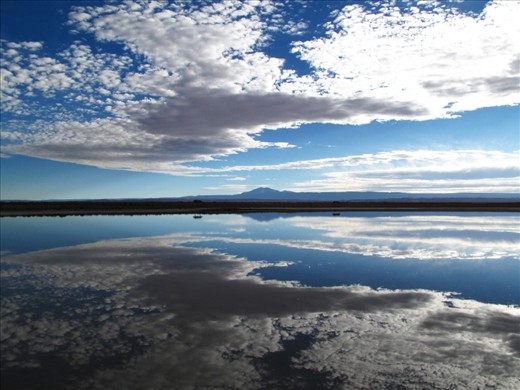 Full of surprises. When you find yourself surrounded with dirt and dry bushes you don’t expect to find a lake so beautiful and so big in the middle of the desert! But there it was, like an oasis.