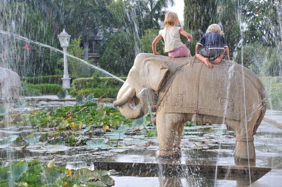 Game of innocence – a moving scene in the beautiful garden Sahelion Ki Bari, Udaipur, India 