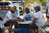 While some of the fishermans prepare the nets for the next day, others play dominoes to pass the time.: by anarpi, Views[285]