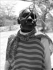 This Kenyan lady wanted me to buy that headpiece.She was selling souvenirs in th: by anastasiamissgreece, Views[373]