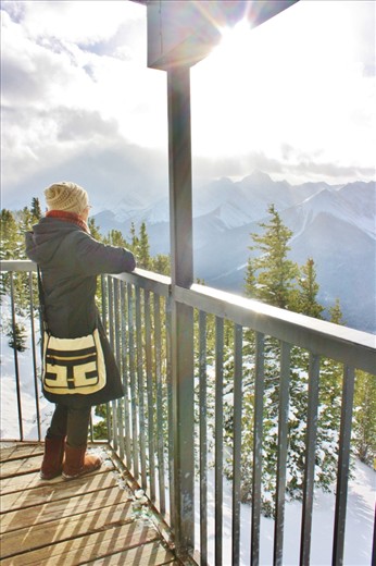 This was taken on top of the sulphur mountain. My sister was amazed by the beautiful view and she had to stop and take it all in. The view is amazing especially for people who have never seen mountain from top. 
