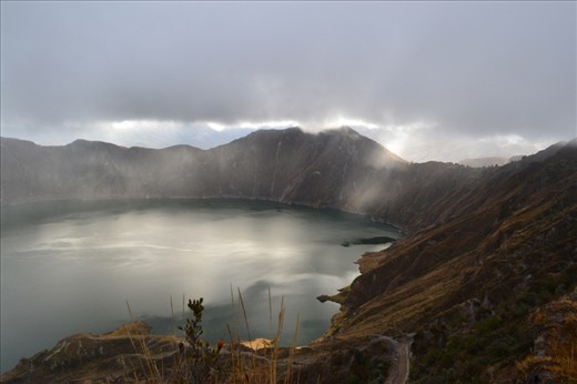 Quilotoa Lake.-Within the Andean highlands lies the crater of Quilotoa, a volcano situated at 4000 meters above sea-level. Due to its high variety and concentration of minerals, its water color shifts from different shades of green, to turquoise and blue.