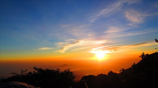 It is only around 10 degrees celcius here camping at the peak of Mount Gede, but harsh wind is blowing a bit agressively so we were chilled to the bone waiting for the sun to rise from the faraway sea. Thankfully, the sun turns out really exquisite with really beautiful contrast on my eyes that time.