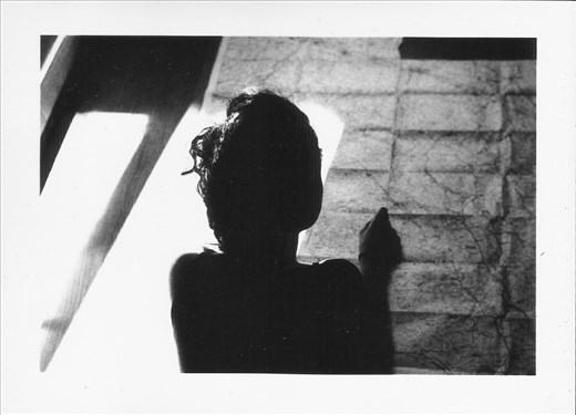 On the wood floor of our home in Tuscany, Ramona is looking up the map.