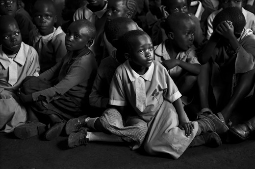 Every  Friday the 450 students gather into two small classrooms for assembly.