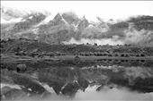 As the clouds lifted, the base of Rinrihirca began to show itself. Giving hope for a beautiful day, despite the felt presence of the rainy season. - Santa Cruz Trek, Huaraz, Peru: by andrewpavlidis, Views[525]