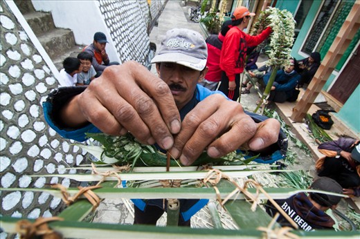The Tenggereses prepare offering during the Kasada Month to pray their god in Bromo Mt, East Java, Indonesia. Kasada Ceremony is held to pray their god for a good year of harvesting. They built offering to be thrown to the crater.
