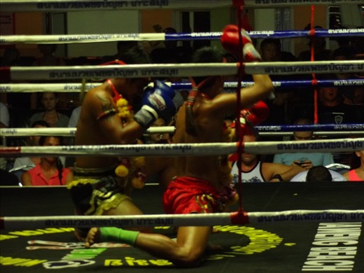 Muy Thai fighting is very ritualistic.  Before every fight (there were 6 of them), the fighters would pray in the center and at each corner of the arena.