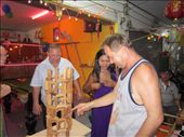 Playing a version of Jenga with a local bar owner and patrons.: by anealis314, Views[311]