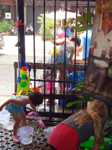 The start of Songkran, Thai New Year.  Huge water festival.  These little girls were outside our guesthouse, ready to go! 