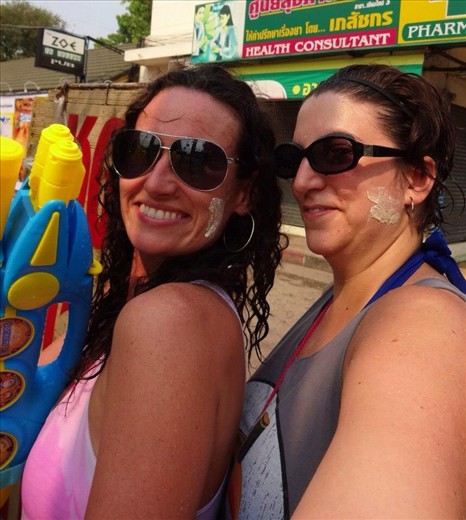 Part of Songkran is paying respect to elders, like parents and grandparents.  The elders place a white powder paste on the younger people's faces.  We somehow got some too!