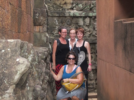 Hanging out at Angkor Thom, in Terrace of the Lepur King.  Visiting this temple was her one request and she was so excited.