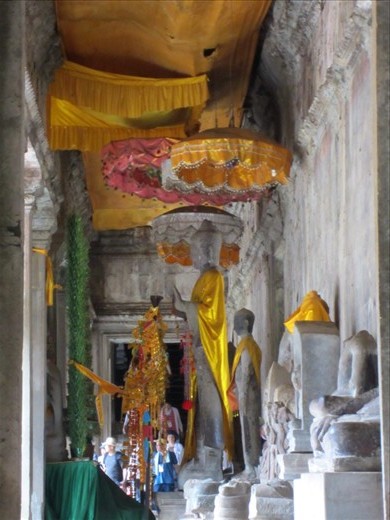 ornate Buddha inside Angkor Wat.  