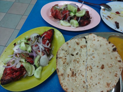Tandori Chicken and Naan.  Yum.  (Side note:  Malaysia's population is primarily Chinese and Muslim.  Lots of Indian and Chinese food.  Also, lots of fried food here and not a lot of fruit like we had in Thailand.)