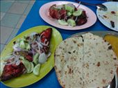 Tandori Chicken and Naan.  Yum.  (Side note:  Malaysia's population is primarily Chinese and Muslim.  Lots of Indian and Chinese food.  Also, lots of fried food here and not a lot of fruit like we had in Thailand.): by anealis314, Views[323]