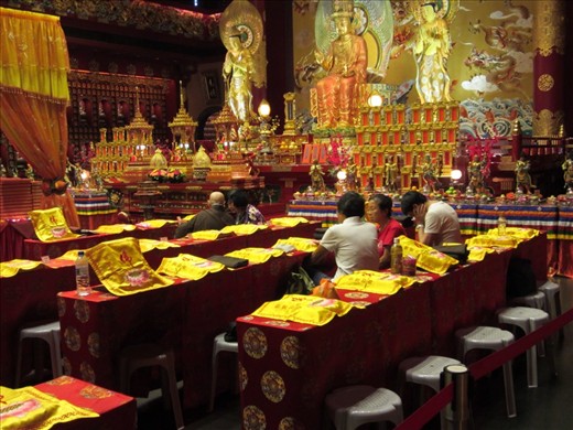 These seats started filling up and right before a left, a service started, complete with monks and these women chanting.