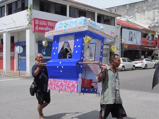 Snapping.  There was a hearse right after this, so I stopped taking photos.